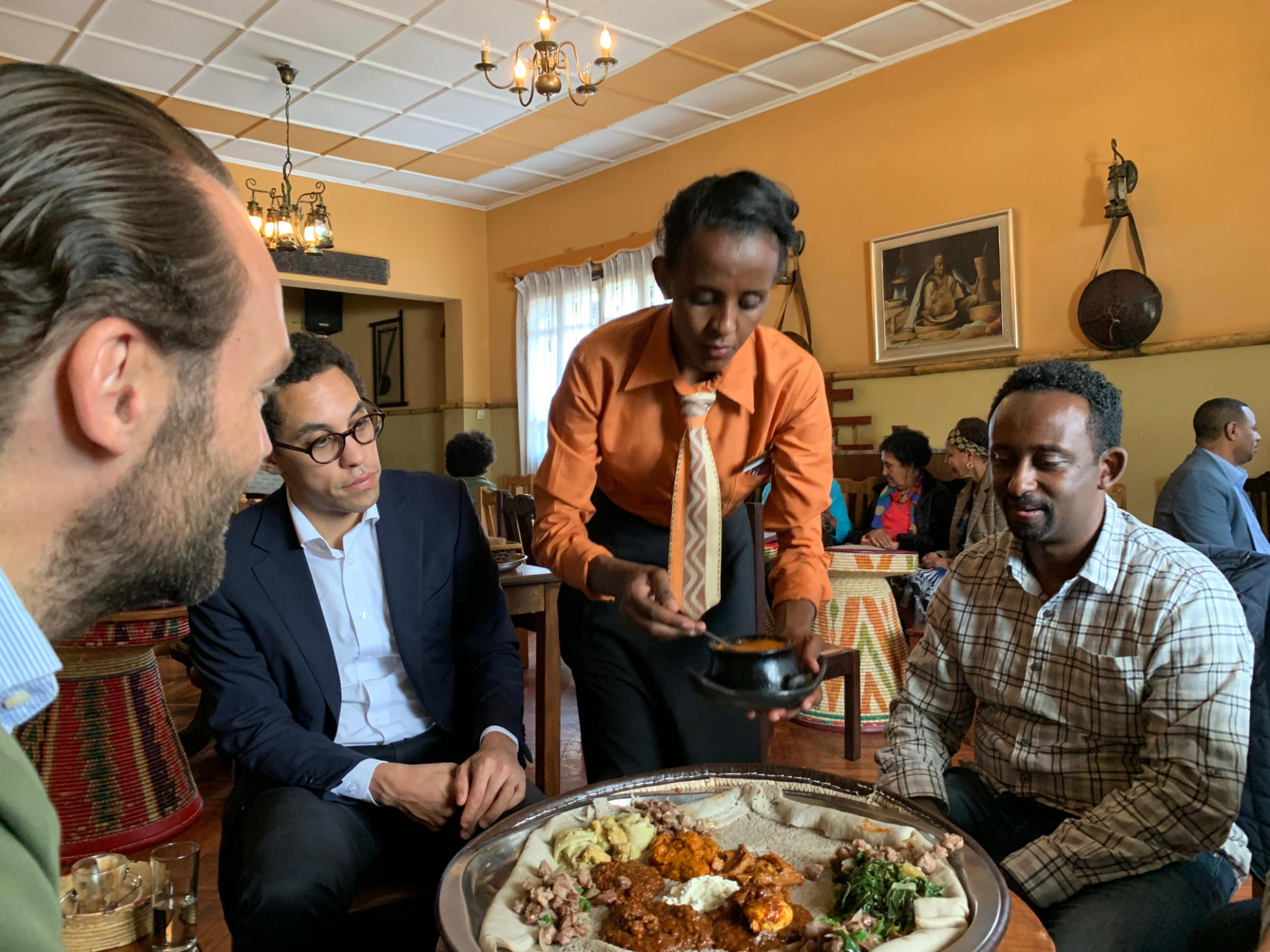 Adiamseged Eyassu, General Manager of Rockstone Ethiopia and Benjam Vetterli, Country Head, Rockstone Ethiopia, share a meal with Dietrich Rogge, Founder of Rockstone